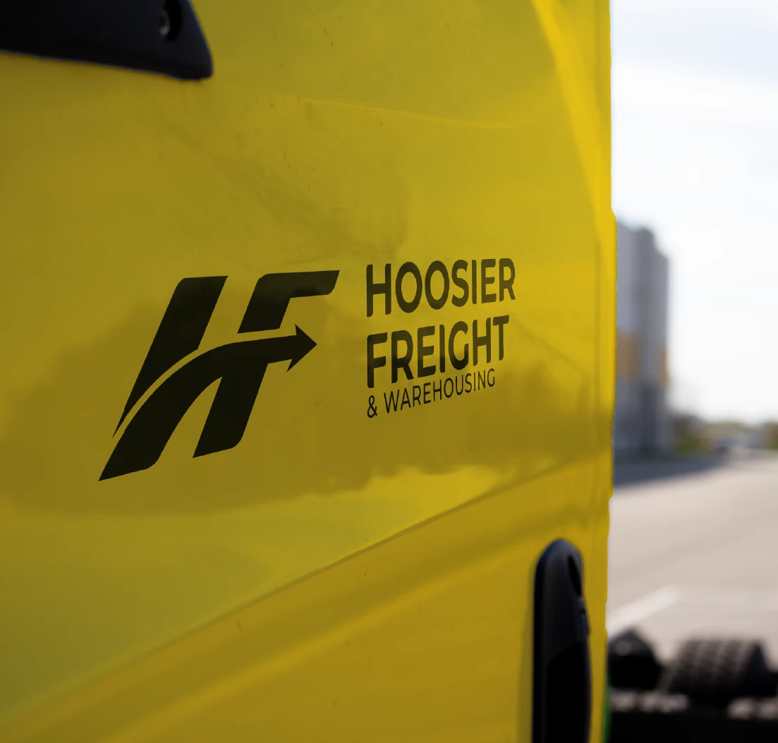 Hoosier Freight logo shown on a yellow truck.